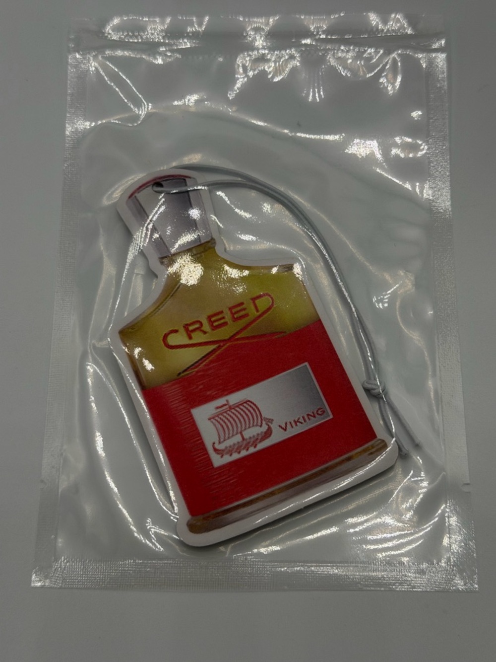 Creed Viking Red and Gold Car Air Freshener